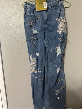 Embellished Blue Flare Jeans with Crystal Floral Detail